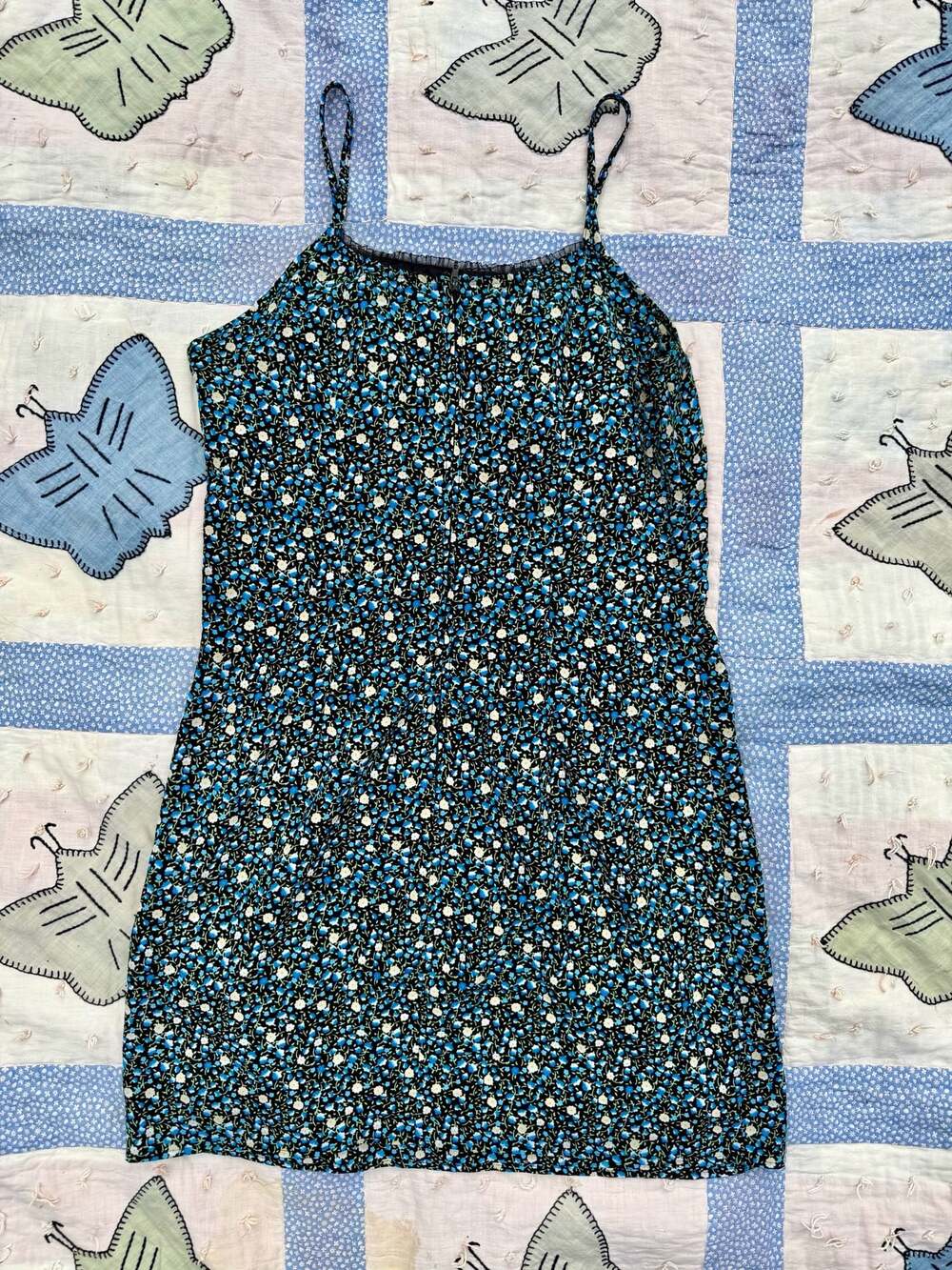 Y2K Eye Candy blue and black floral print spaghetti strap mini dress